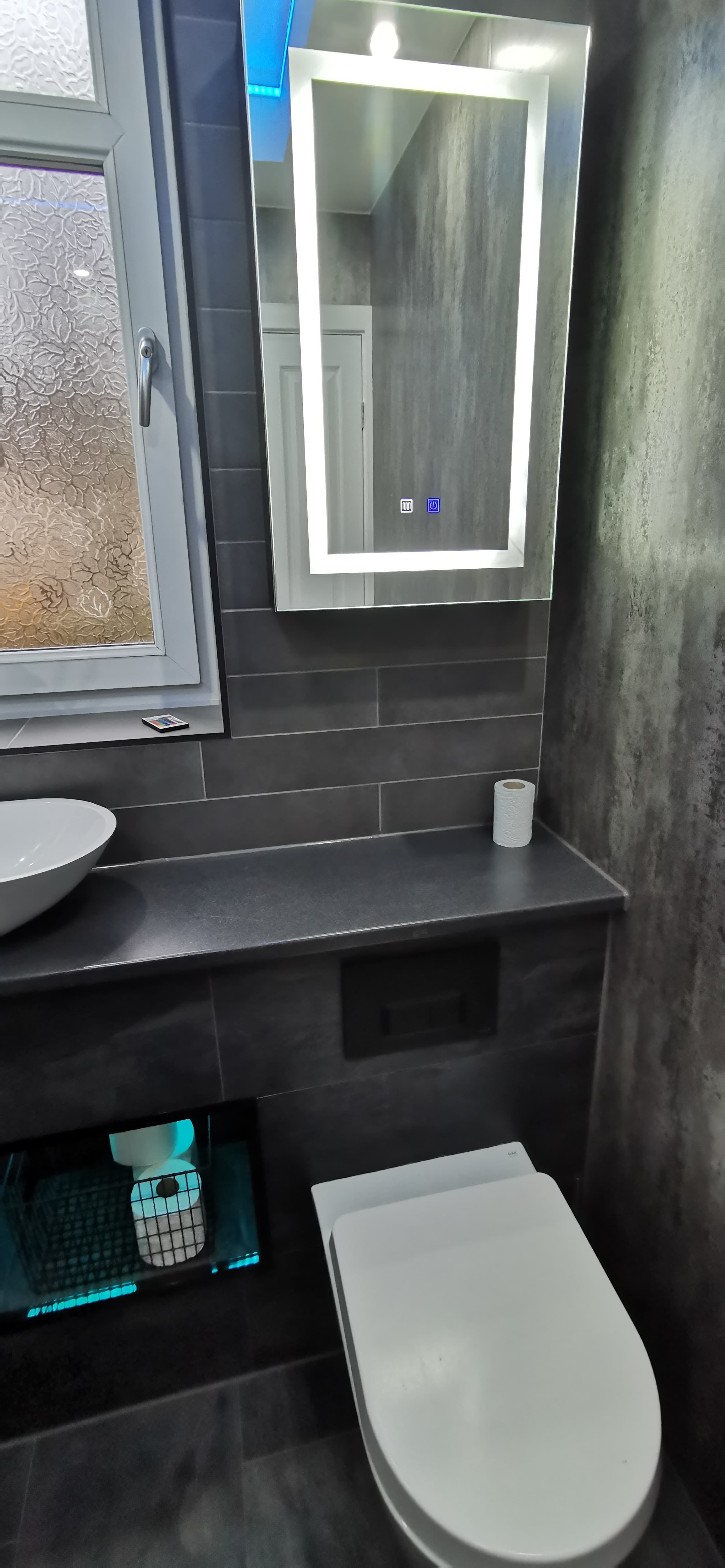 Bathroom first-fix plumbing with wall-hung WC frame and copper pipework