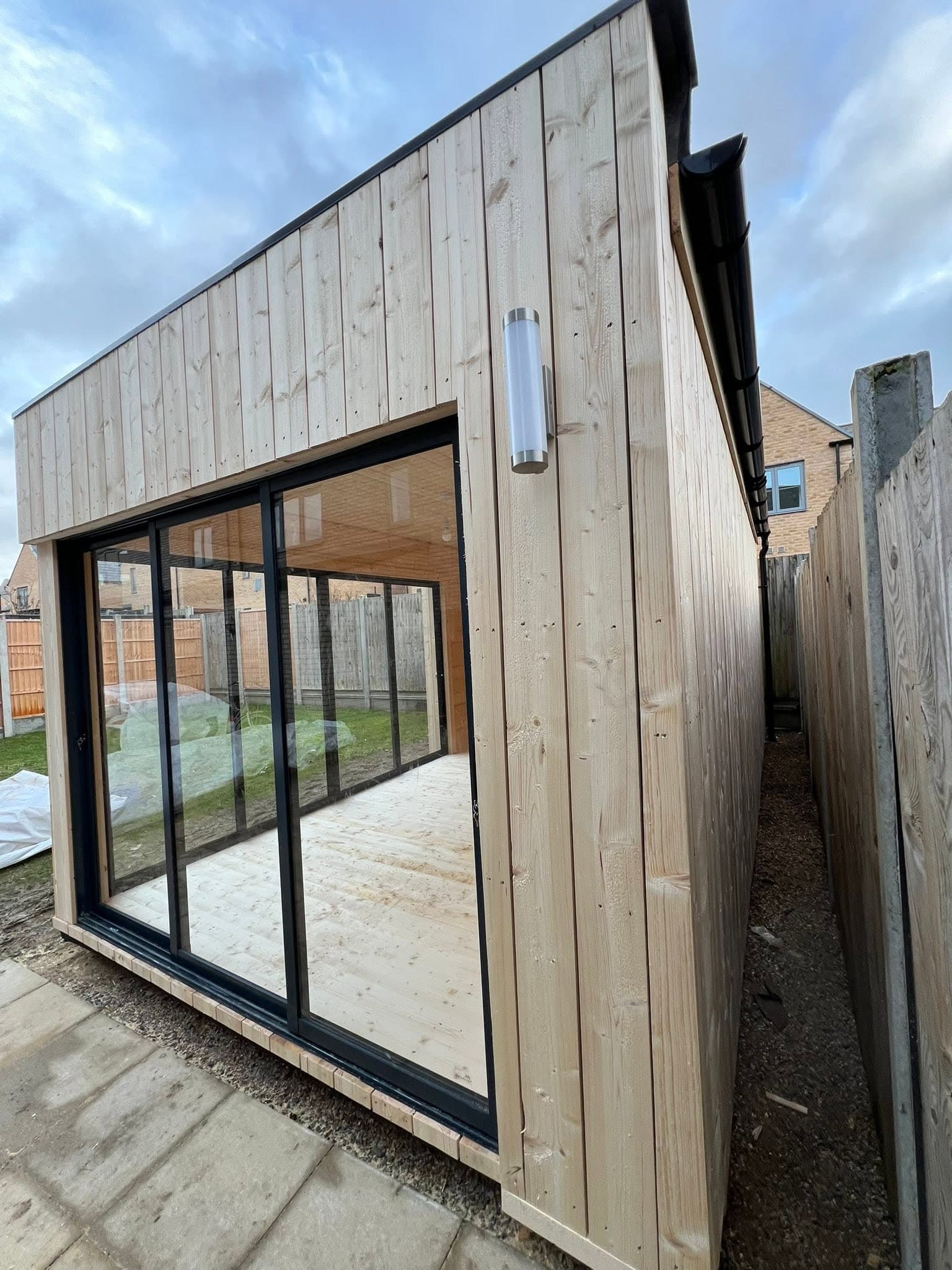 Modular garden room with full-height glazing by Greenwell
