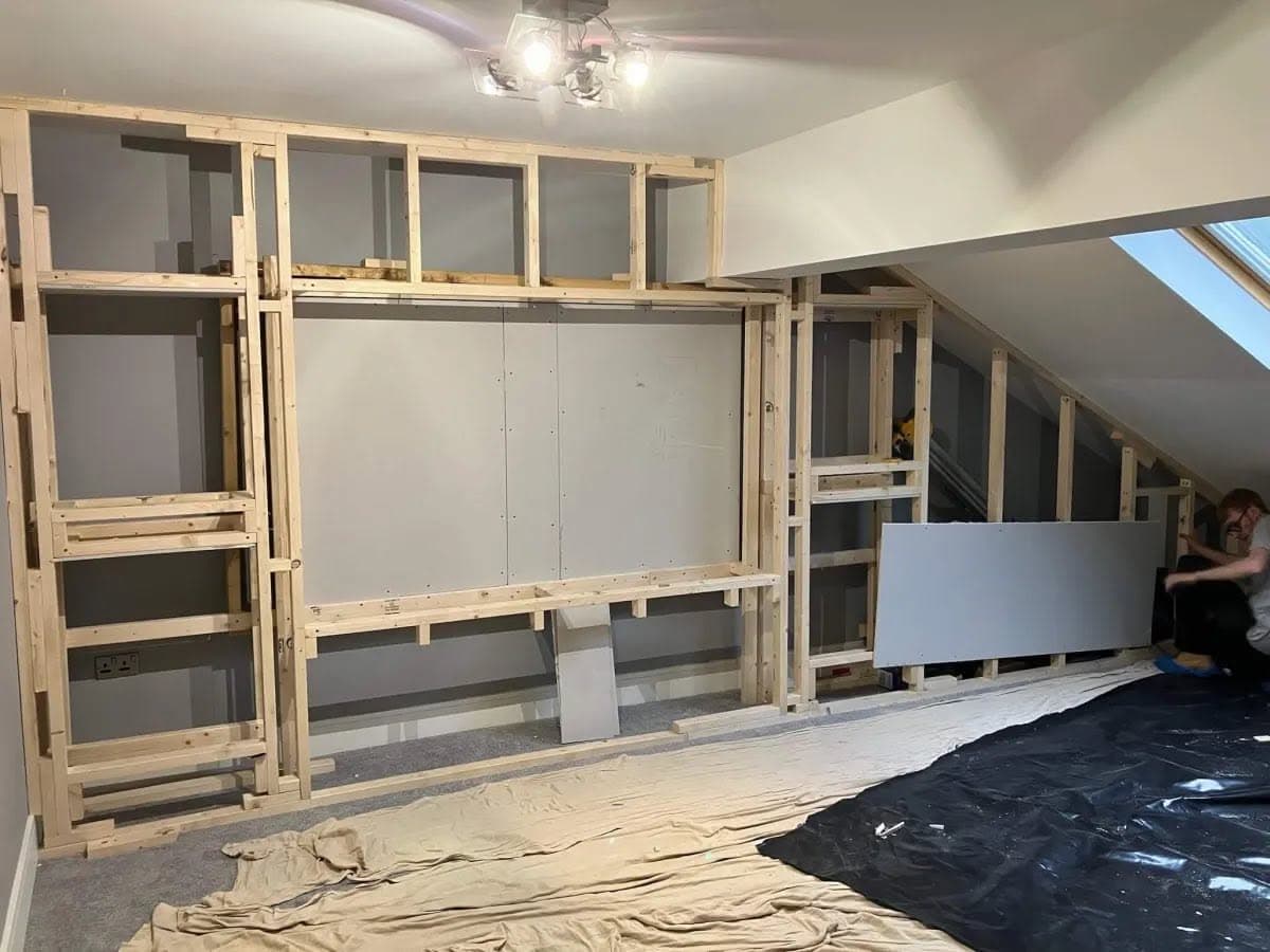 Media wall under construction, stud frame and boarding