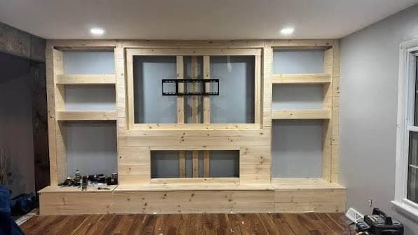 Timber-clad media wall unit with concealed cabling